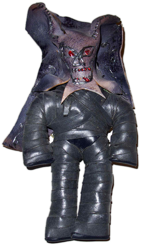 weird_doll The seller of this handmade tied-leather figure claims it is a Haitian voodoo doll meant to repel evil. Supposedly its body holds graveyard dirt, too.