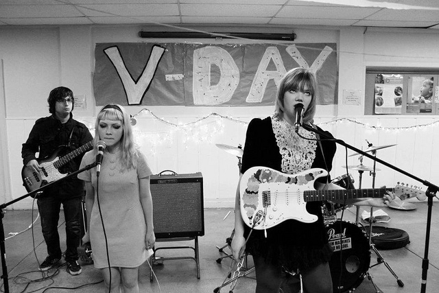 V-Day Tavi (middle) performs with friends for V-Day, an activist event to end violence against women.