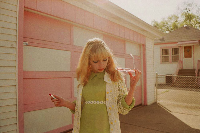 tavi in pink Tavi keeps track of the kitschy spots in her suburban town that look straight out of the past, like this pink and white house. Photo by Petra Collins.