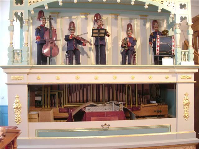 weber_orchestrion A Gebrüder Weber orchestrion with automata from the Elztalmuseum in Waldkirch, a town in the Black Forest of Germany famous for its music boxes. Photo by John Page (www.johnpage.co.uk), from the Independent Mechanical Organ Discussion Forum.