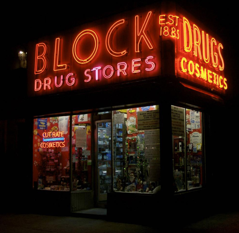 image Block Drugstore in the East Village closes early, so its sign is rarely lit. Photo by Hively.