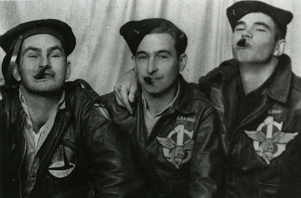donkeys Glider pilots Sam Altman, Frank Randall, and Troy Shaw of the 1st Air Command Group goof around for a photographer in India in 1944.