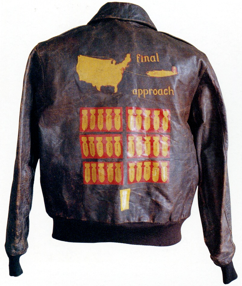 jacket_finalapproach This unusual A-2, belonging to Staff Sgt. James Eagan, who flew the B-24 bomber called "Final Approach" for the 458 Bomber Group, has the names of the targets painted on each bomb of the mission tally. From the collection of Leighton Longhi.
