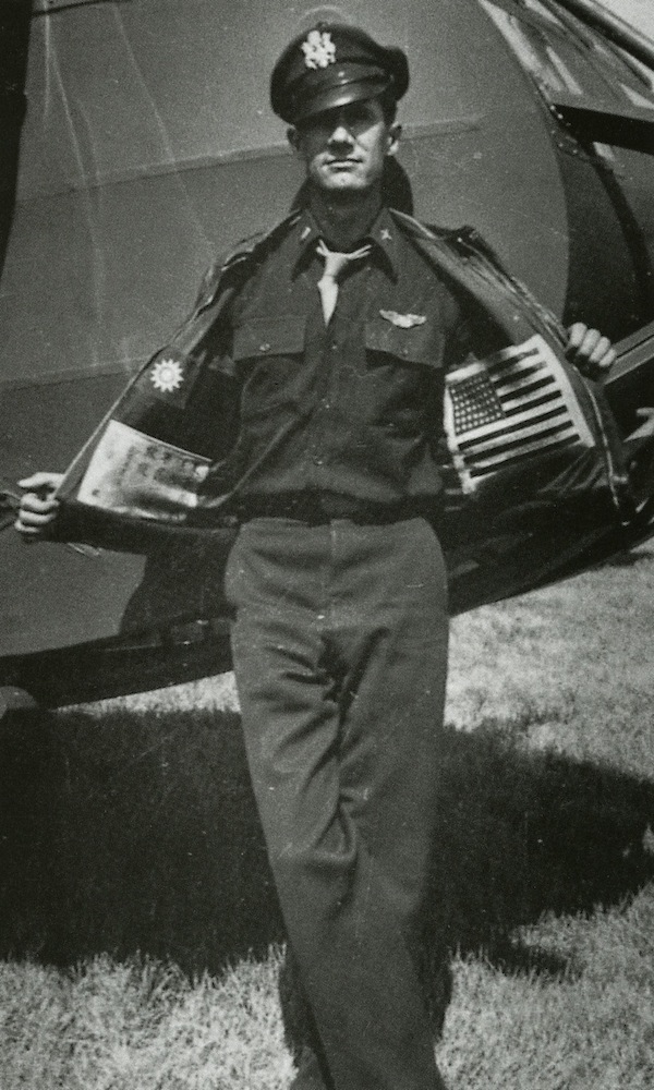 jacket_innerchits Glider pilot Nesbit L. Martin, from the 1st Air Commando, shows off his blood chits sewn inside his A-2.