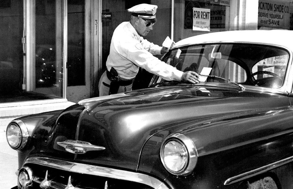 police By the 1950s, parking regulations were much easier to enforce thanks to the nifty new meters. Photo courtesy Roth Hall.