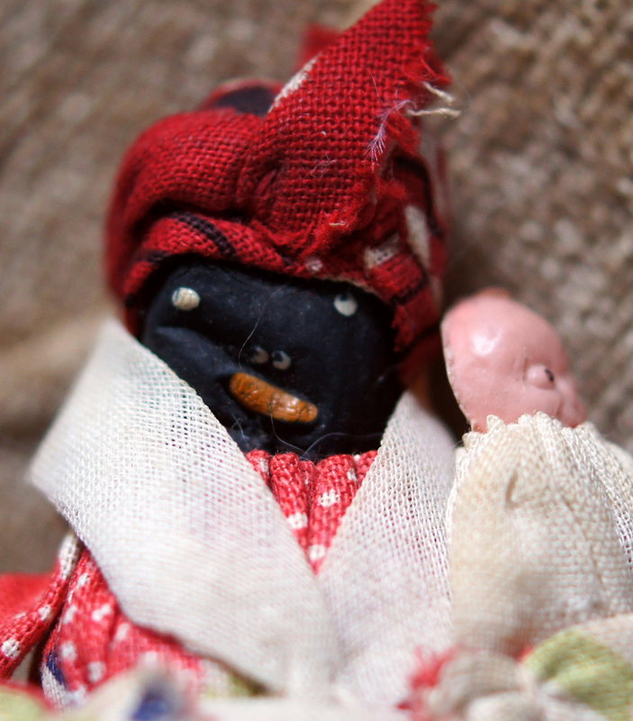 picture1 A 1920s Mammy doll, made from a black rubber bottle nipple. Via Stonegate Antiques.