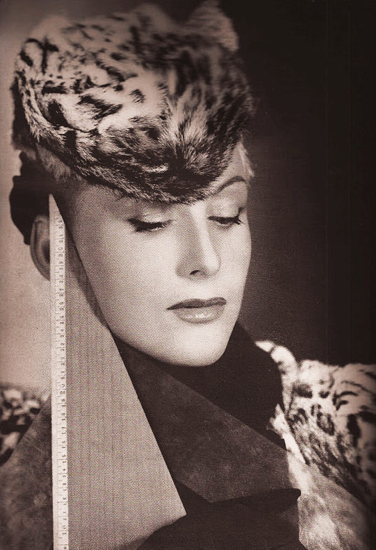 Bazaar-September-1939-20-1 Elsa Schiaparelli's hat made from a leopard's face was featured in the September 1939 issue of Bazaar. (Via DevorahMacdonald.blogspot.com)