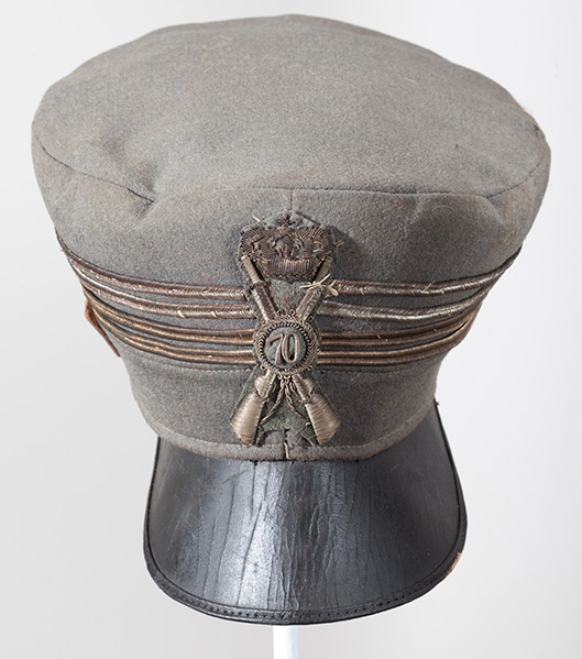 seuss_military Geisel collected military hats when he was in World War II. This is an Italian line infantry officer’s visor cap from the war. The insignia and number stands for the 70th Line Infantry Regiment. The four gold bands indicate the rank of colonel. (Courtesy of the Dr. Seuss Estate)