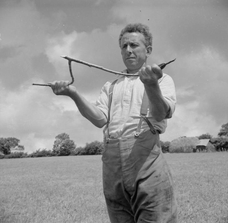GeorgeCaselyDevon This photo of Devon farmer George Casely was taken for England's Ministry of Information in 1942. The original caption read: "Casely has the power of divining and has sunk a well in several of his pastures."