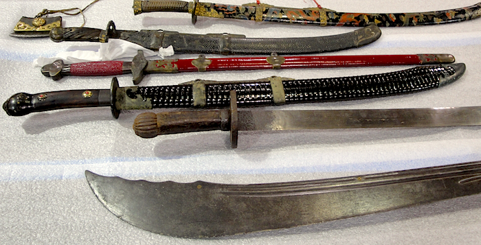 BoydGroup1 Swords in Boyd's personal collection include several from the Yuan Dynasty (top, the red one, bottom), the "Mongrolian" (from the early 1200s; it's the black sword below the red one), and an unsheathed broad sword from Karakorum, Mongolia, that dates to 1500. All are included a Genghis Khan exhibition that will be in Vancouver, B.C. in August 2013.