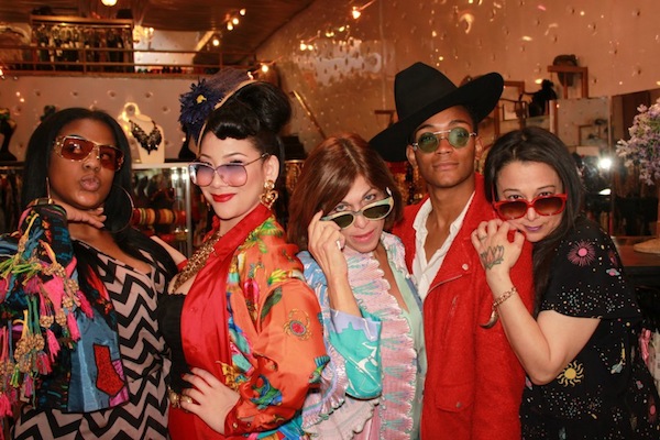 fashion_raymondstaff Doris Raymond (center) is flanked by her staff and fellow "L.A. Frock Stars" cast members (from left) Jascmeen, Shelly Lyn, Kyle, and Sarah. Via "L.A. Frock Stars" Facebook page.