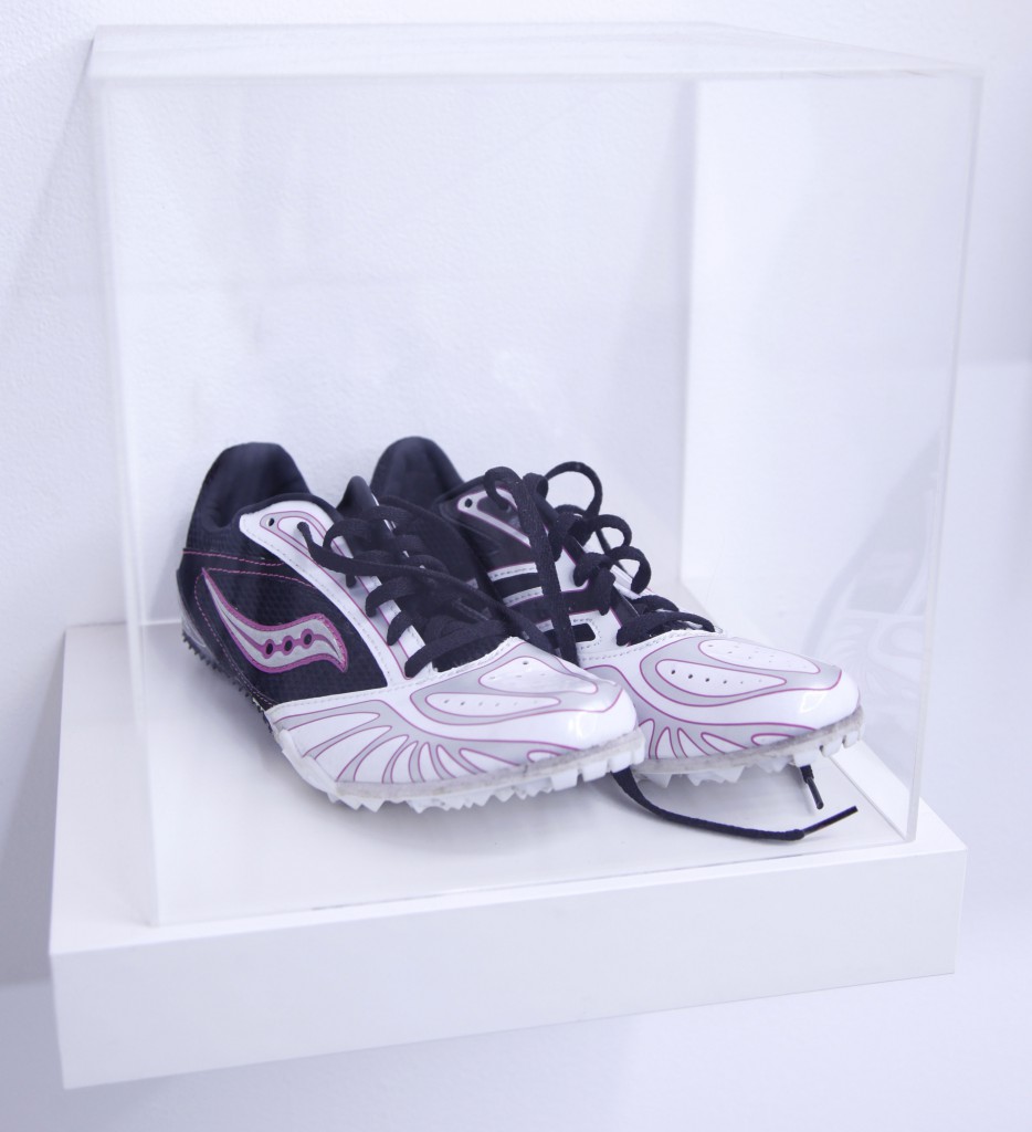 Emily-Spivack_runningshoes2_MG_9965-copy These shoes were worn by a runner who blacked out for the final xx miles of the race, collapsing after she crossed the finish line. Photo by Shana Lutker.