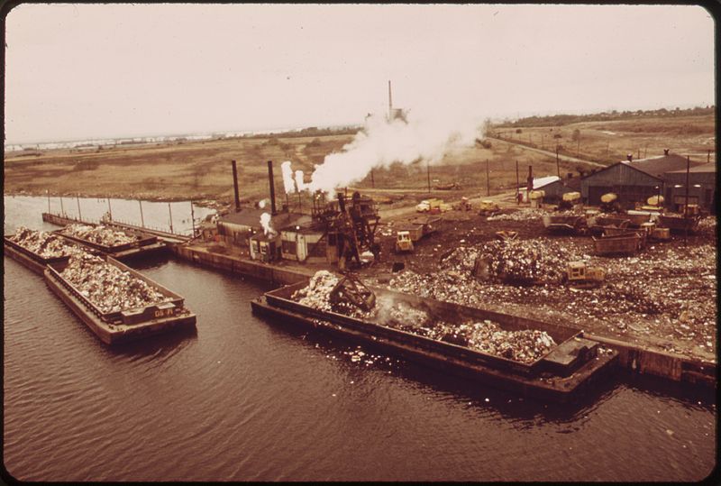 800px-GARBAGE_SCOWS_BRING_SOLID_WASTE,_FOR_USE_AS_LANDFILL,_TO_FRESH_KILLS_ON_STATEN_ISLAND,_JUST_EAST_OF_CARTERET,_NJ_-_NARA_-_548315 Nagle believes a better connection to our garbage's afterlife might help curb our monstrous waste. Above, barges transport waste to Fresh Kills in 1973.