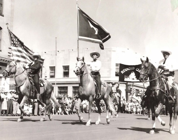 RomieOnHorse Above: Romie Nunn, at center carrying the Wyoming state flag, on his horse, Ginger. Top: A water witch in Pie Town, New Mexico, photographed in 1940 by Lee Russell for the Farm Security Administration.
