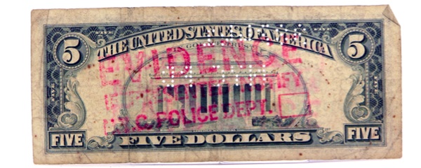 mute2 This five-dollar bill was deemed evidence by the New York City Police Department. Via mmuseumm.com