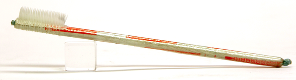 prisoner1 This toothbrush was improvised by an inmate from Saran Wrap and his canteen order form; from a collection of objects made by prisoners for prisoners gathered by multimedia artist Baron Von Fancy. Via mmuseumm.com
