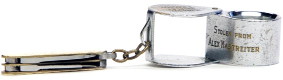 stolen The jewelry loupe engraved with "Stolen From Alex Hastreiter." Courtesy of Museum