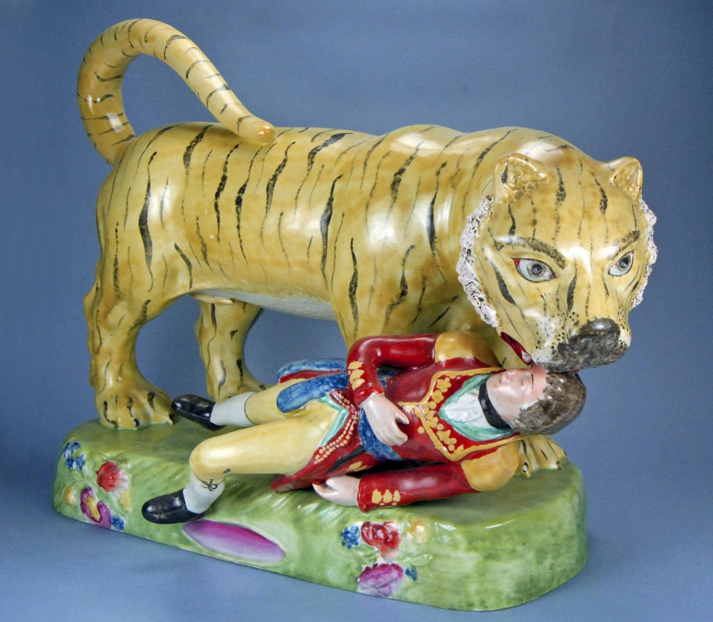 135-004-BBB-copy.jpg-new Another violent figurine showed the death of Lt. Hugh Munro, who was attacked by a tiger while hunting in India. The figure was modeled after a life-size automaton created for a Sultan in the Kingdom of Mysore, ostensibly celebrating India's defeat of the British. Photo © Myrna Schkolne 2013