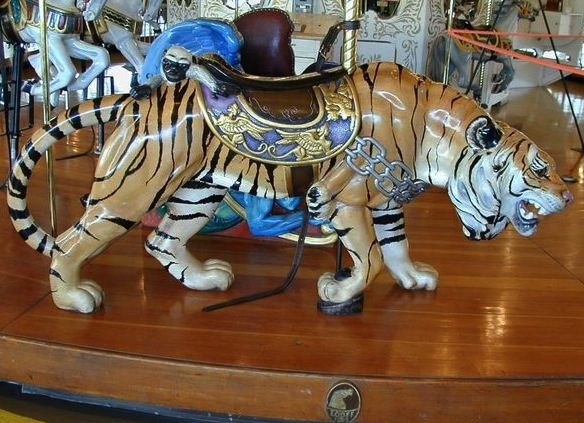 Sneaky_spokane1909 Sneaky the Tiger, part of the 1909 Looff carousel in Spokane, is one of only three carousel tigers carved stalking. Pam Hessey restored the other two of these Looff tigers, which are worth around $80,000, for private collectors. (© Gary Nance, via carousel.org)