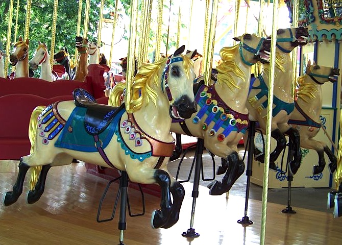 WorldsofFun.002_illions Master carver Marcus Illions was known for his horses with wild, flying manes covered in gold leaf. This 1926 carousel of his lives at Worlds of Fun in Kansas City, Missouri. (© Jean Bennett, via carousels.org)