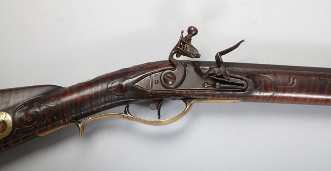 kentuckyrifle Top: Gary Cooper plays a U.S. marshal in New Mexico territory who has to face-off with his enemy in the 1952 Hollywood Western, "High Noon." Above: An example of a Kentucky rifle, manufactured by Nicholas Beyer circa 1807, the earliest type of gun on the frontier. (From the George Gamble Collection, Autry National Center)