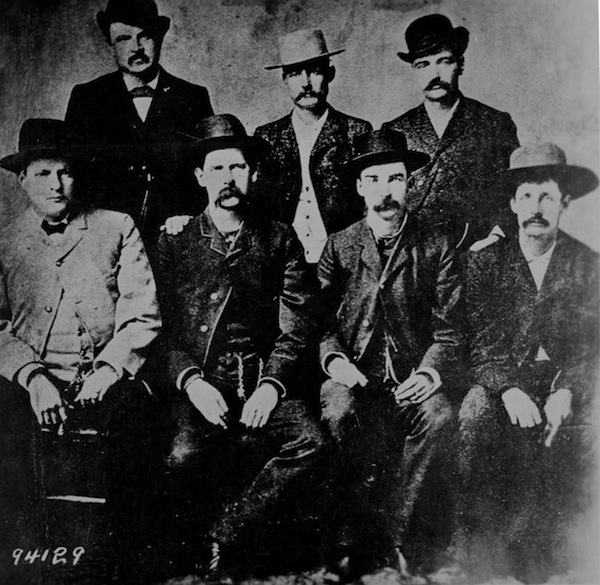 wyattearp-andothers The Dodge City Peace Commission, a vigilante group pictured in 1883, featured (from left) Charlie Bassett, W.H. Harris, Wyatt Earp, Luke Short, Frank McLain, Bat Masterson, and Neal Brown. (Photo by Camillus S. Fly, via WikiCommons)
