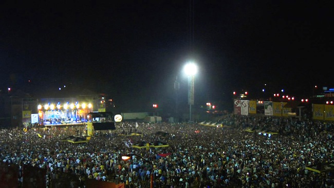 crowded-stadium The rowdy party atmosphere of the Guča Trumpet Festival is often compared to Woodstock. (Still from “Brasslands” courtesy of the Meerkat Media Collective)
