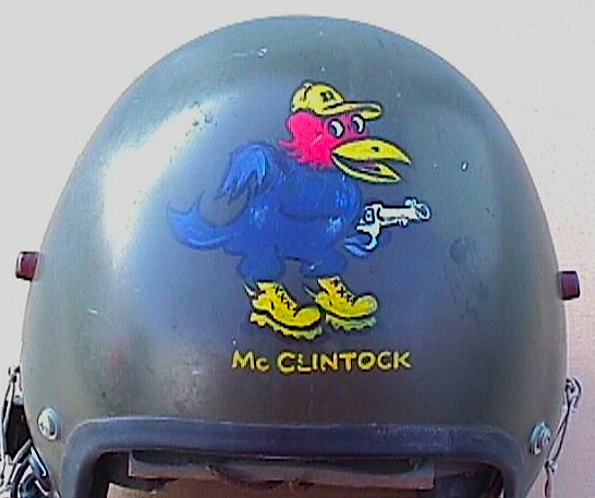 mcclintockhelmet Army fourth-class Specialist John A. Hubert, a.k.a. Harpo, painted this ballistic helmet with a University of Kansas Jayhawk holding a John Wayne-style six gun for George McClintock. (Courtesy of McClintock, via VHPAMuseum.org)