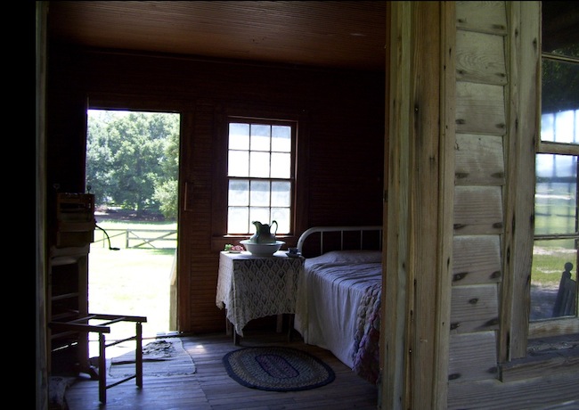 slavery_sharecropper A look inside a sharecropper's cabin at Poplar Grove peanut plantation in Wilmington, North Carolina. Before the war, Poplar Grove relied on 64 enslaved laborers. (Photo by Arnold Modlin)