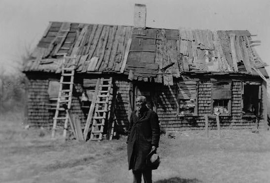 henryrobinson Henry Robinson, who was interviewed for the Works Progress Administration's slave narrative project, stands in front of a dilapidated cabin in the 1930s. (Via Library of Congress)