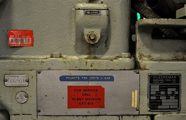 Cleereman tags A variety of tags on the side of the Cleereman drill press. The blue "peanuts" label was put on the machine by someone at NARF.