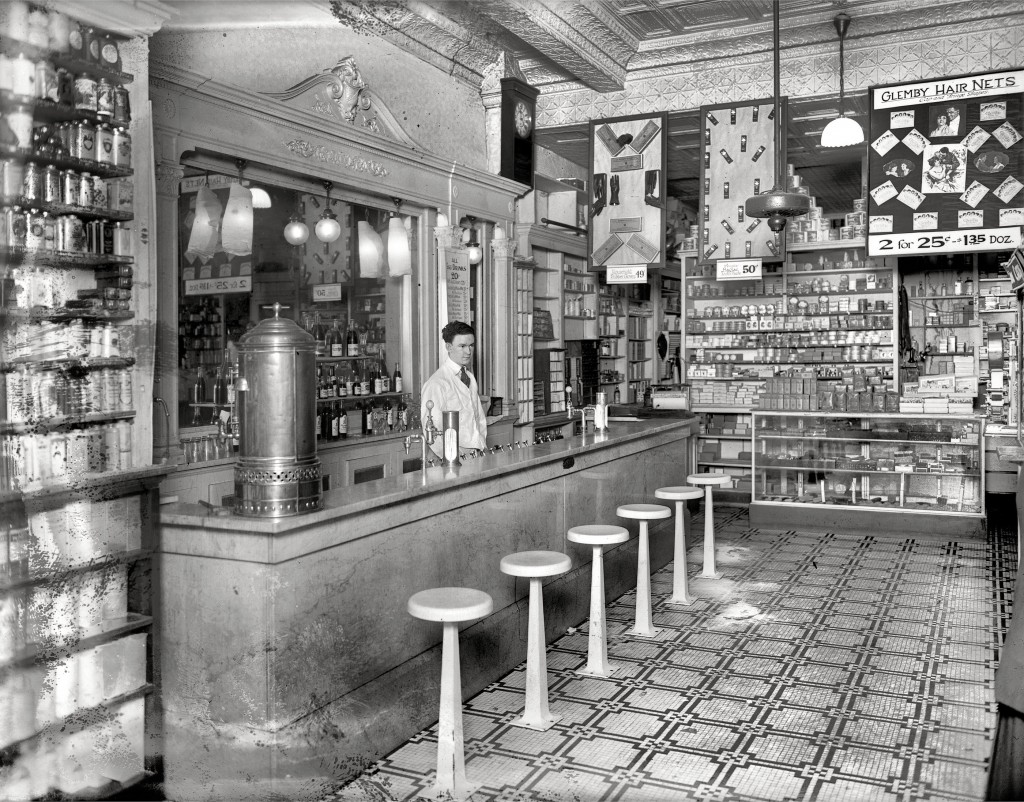 By the early 20th century, soda fountains were an integral part of neighborhood drugstores, such as this counter in a Washington, D.C. pharmacy, circa 1920. Via Shorpy.