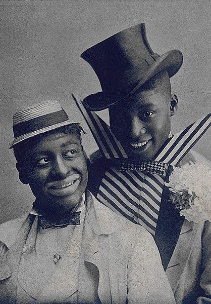 418px-WilliamsWalkerJohnahMan Vaudeville performers Bert Williams, at left, and George Walker in blackface and comic outfits in 1903. (From sheet music "I'm a Jonah Man" from the musical "In Dahomey")