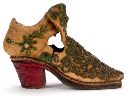 By the late 17th century, men's footwear incorporated heels drawn from Persian riding boots, like this boy's boot with a stacked leather heel. Courtesy the Bata Shoe Museum.