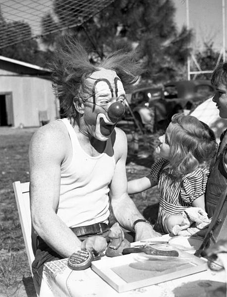 clown_lou jacobs Ringling Circus clown Lou Jacobs with Carla Wallenda, the daughter of tightrope walkers, in Sarasota, Florida, in 1941. (From the State Library and Archives of Florida)