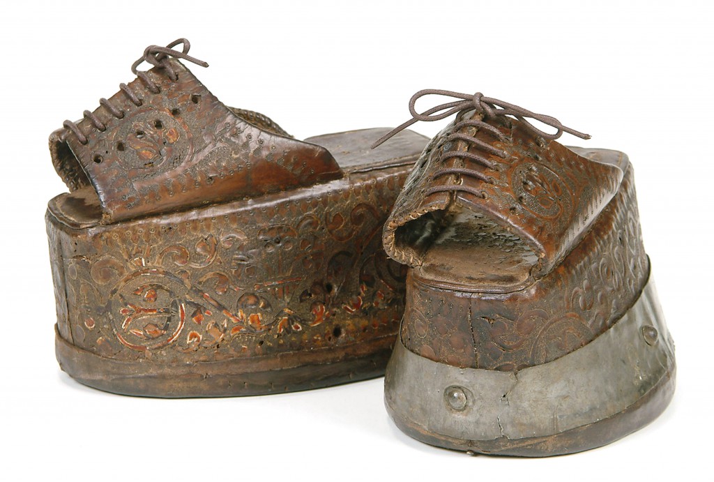 This pair of chapins, the Spanish version of chopines, has cork platforms covered in elaborately tooled leather. Image courtesy the Bata Shoe Museum.