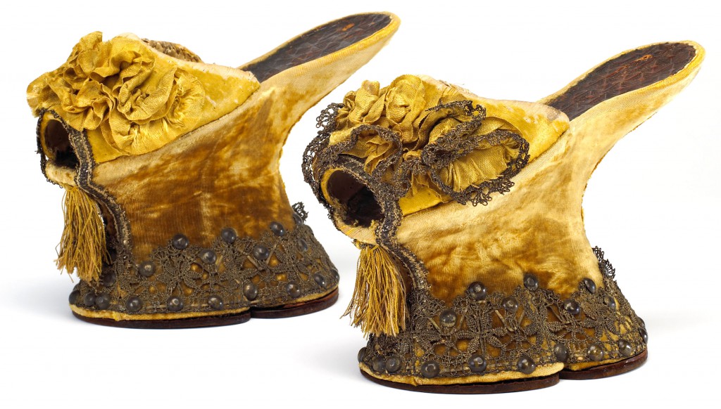 In the 16th century, upper-class Venetian women would have worn elegant chopines like this pair of velvet-covered shoes, which were explicitly designed as luxurious fashion (circa 1580-1620). Courtesy the Bata Shoe Museum.
