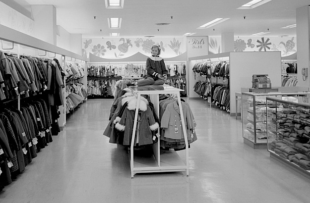 bloomingdates_loewy Top: The Art Deco exterior of Bullock's Wilshire luxury department store in Los Angeles, built in 1929, was designed by architects John and Donald Parkinson. (Via TenOver6.com) Above: The Raymond Loewy-designed interior of the girls' clothing department in Bloomingdale's in Hackensack, New Jersey, in 1959. (Via the Gottscho-Schleisner Collection at the Library of Congress)