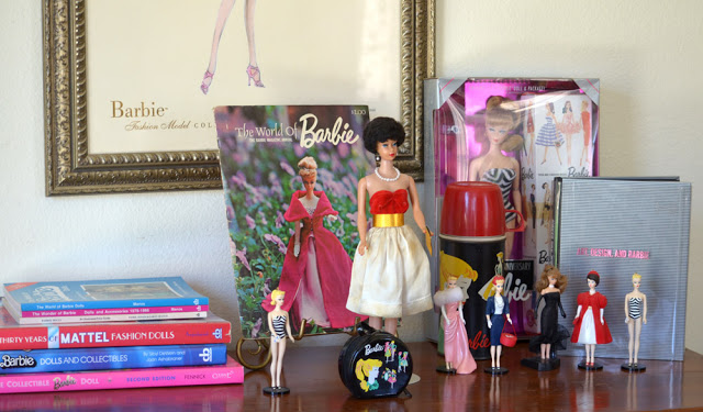 Top: Eskander with a Cabbage Patch Kid she designed in the late 1990s. Above: Eskander isn't really a doll collector, but she still has her first Barbie from the 1950s.