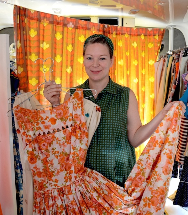 melissa_gonzales Melissa Gonzales, owner of the Vintanthromobile, shows off a vintage floral dress. Her converted shuttle bus is Connecticut's first and only traveling vintage boutique. (Via gladragsdoc Flickr)