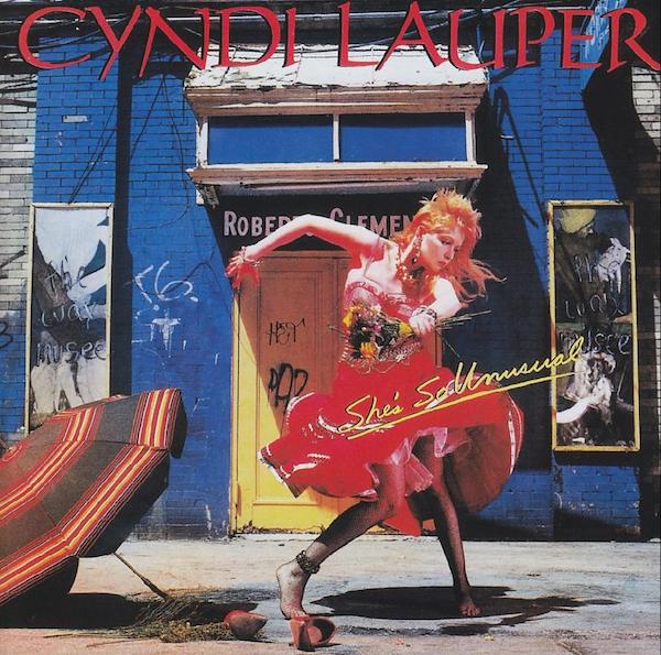 jem_cyndi_cover Top: 1980s cartoon rock superstar Jem performs in a music video. (Via AnimationMagazine.com) Below: Jem-inspiration Cyndi Lauper on the cover of 1983's "She's So Unusual," the album that spawned the girl-power mega-hit, "Girls Just Want to Have Fun."