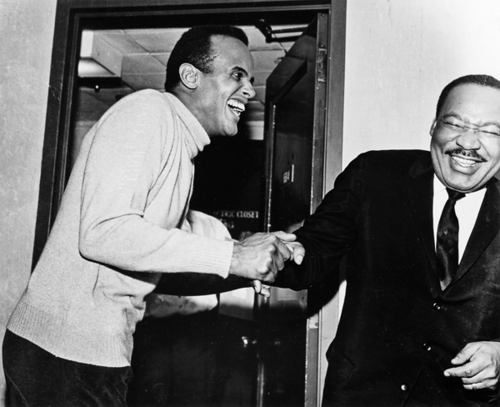 vbg_belafonte_king_knopf_mysong Harry Belafonte and Dr. Martin Luther King, Jr., have a laugh. The actor put a good deal of money into the civil-right movement; once he raised $50,000 to bail King out of jail in Birmingham, Alabama. (Photo via the book "My Song" by Alfred A. Knopf)