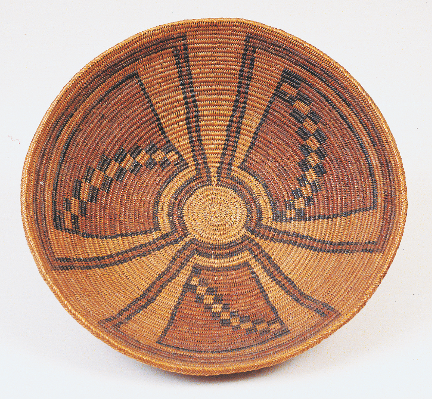 109 Pueblo A 19th-century Pueblo tray from the Blaugrund collection. It coils left and features natural and dyed sumac sewing splints.