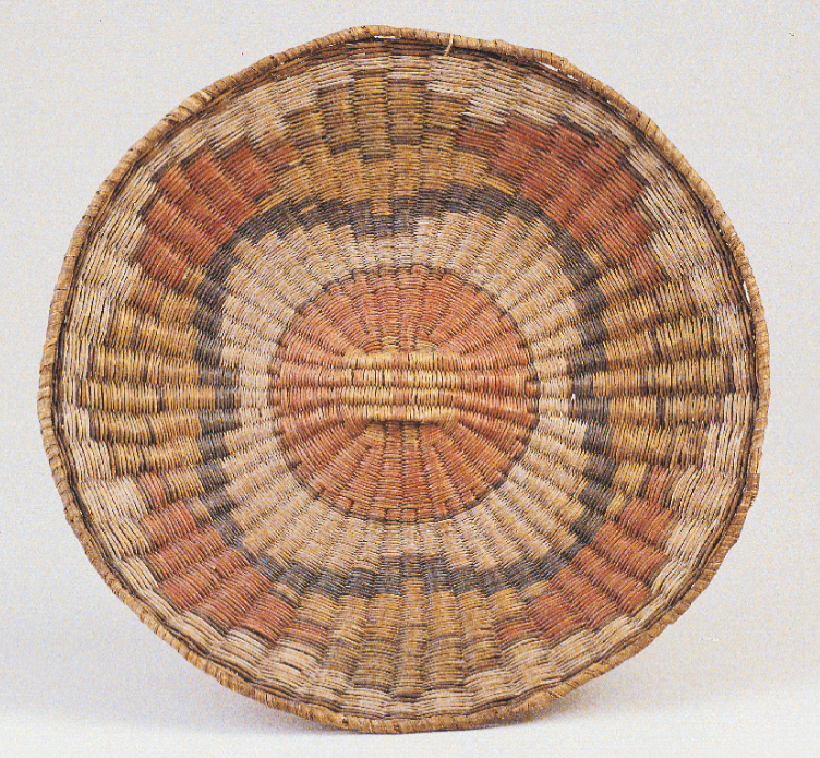 124 Hopi Wicker This circa-1900 wicker plaque from the Blaugrund collection is characteristic of the work of Hopi weavers who lived at Third Mesa.