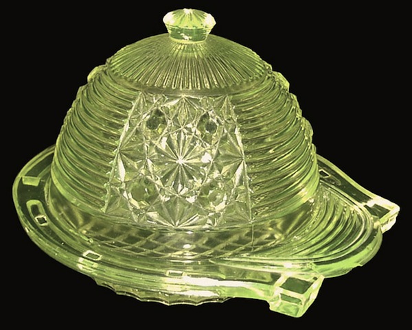 kingjockey1lg A Vaseline glass butter dish and cover in the shape of a horseshoe and jockey's cap. Attributed to King Glass of Pittsburgh, late 19th century. Photo via Dave Peterson at <a href="http://www.vaselineglass.org/">VaselineGlass.org</a>