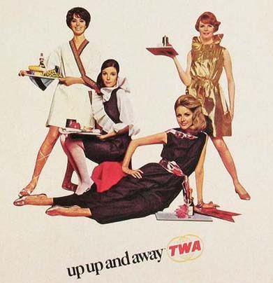 airlines_twa_paperuniformad A TWA ad from 1968 shows flight attendants in their cuisine-themed paper uniforms.
