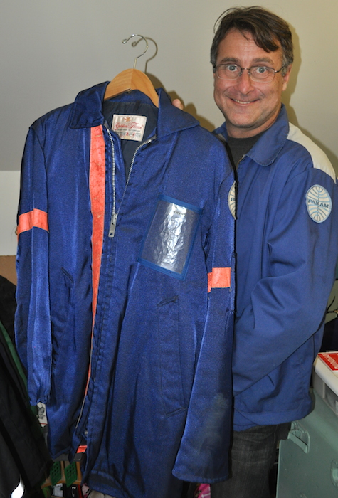 airlinetodd_panamjackets Lappin holds up a winter-weight Pan Am jacket. (Photo by Lisa Hix)
