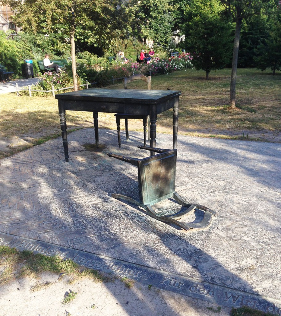Kurfürstendamm. Above: Karl Biedermann's sculpture, surrounded by the text of a Nelly Sachs poem, at the Pogromnacht memorial in Koppenplatz.
