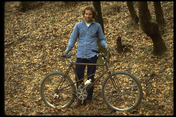 JoeBreezerOne Joe Breeze with Breezer #1 at the bottom of Repack, after winning the race on the bike's first ride down the road, 1977.