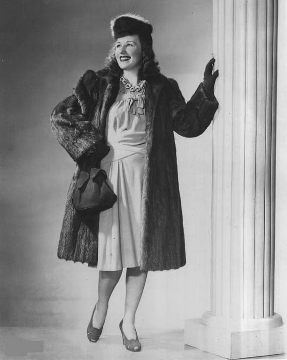 trina_40s_artists_dalemessickEDIT Dale Messick wears fabulous 1940s fashion in a publicity shot. Despite her success, she always felt left out of the boys club of male cartoonists. (Via "Pretty in Ink")